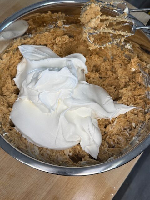 Add cool whip to the filling and mix to combine.