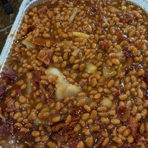 Apple pie baked beans in metal container.