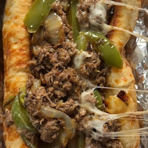 Philly cheesesteak wrapped in foil.