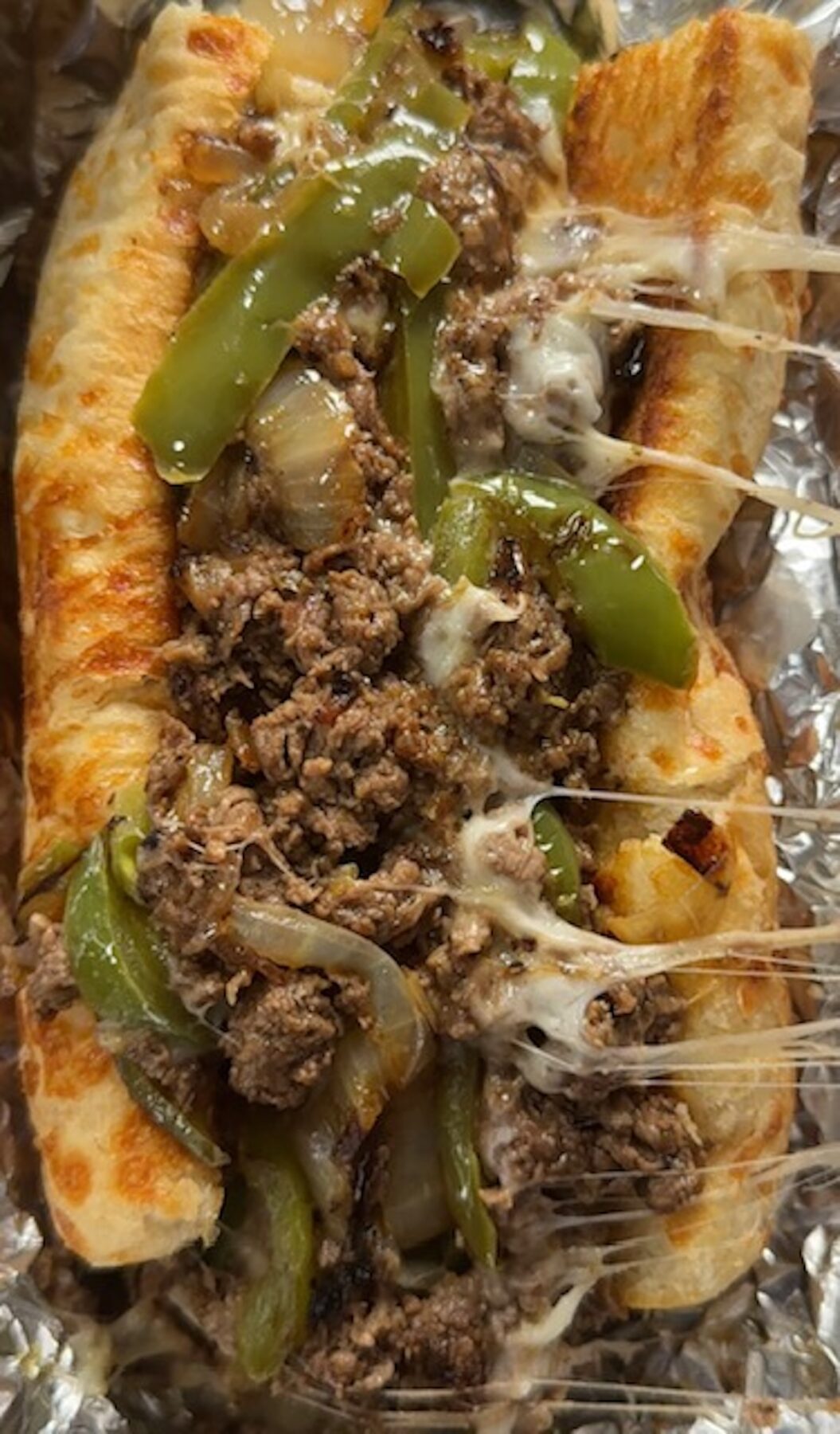 Philly cheesesteak wrapped in foil.