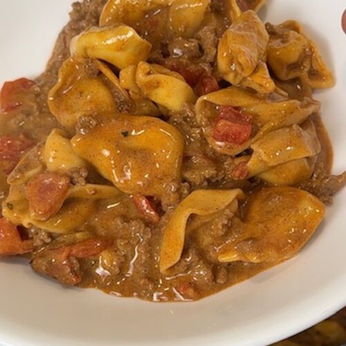 A bowl of a taco tortellini.