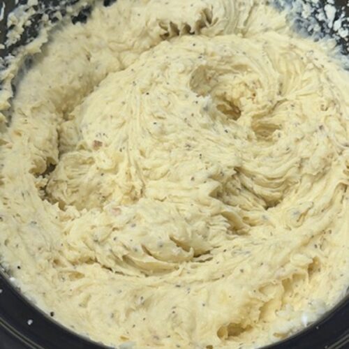 Slow cooker mashed potatoes in a crockpot.