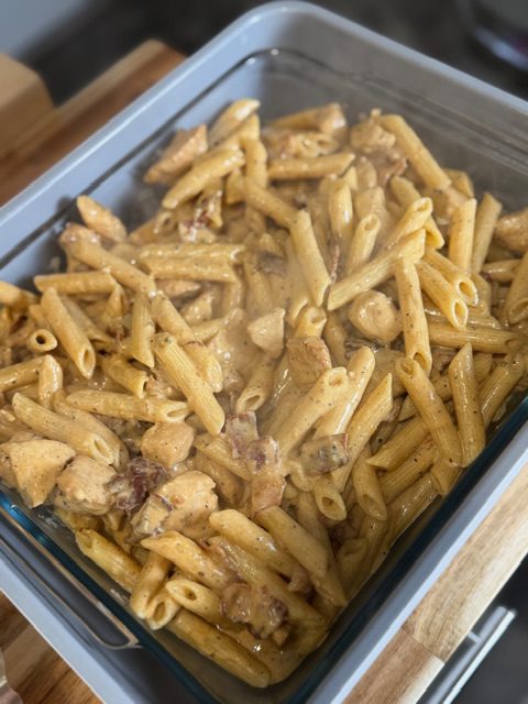 A baking dish with crack chicken pasta.