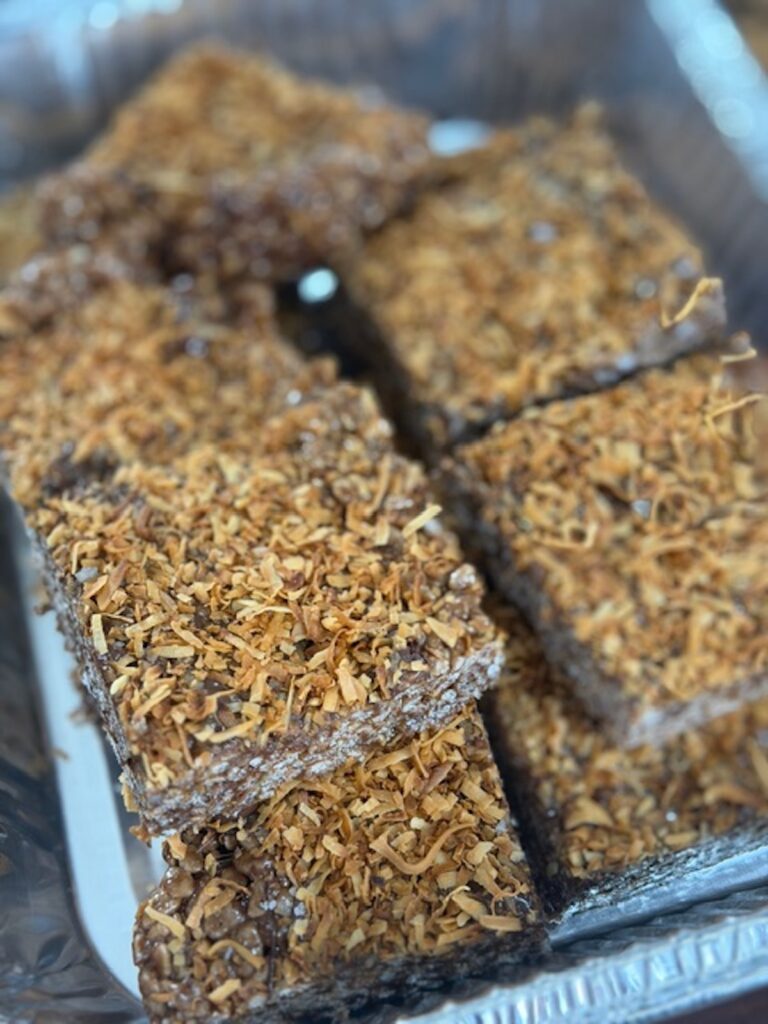 Cut chocolate rice krispie treats stacked on top of each other.