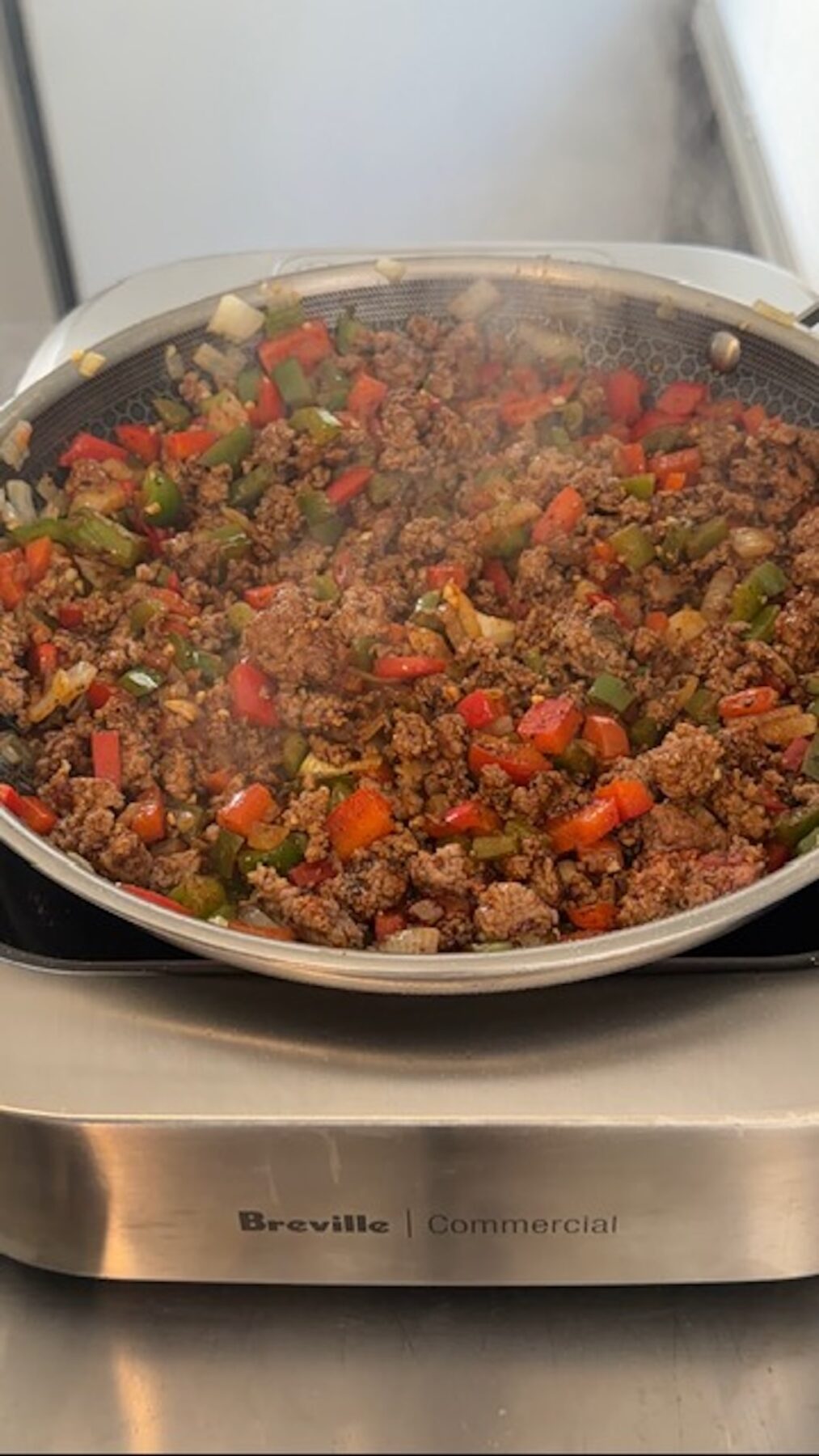 unstuffed peppers mixture in pan cooking