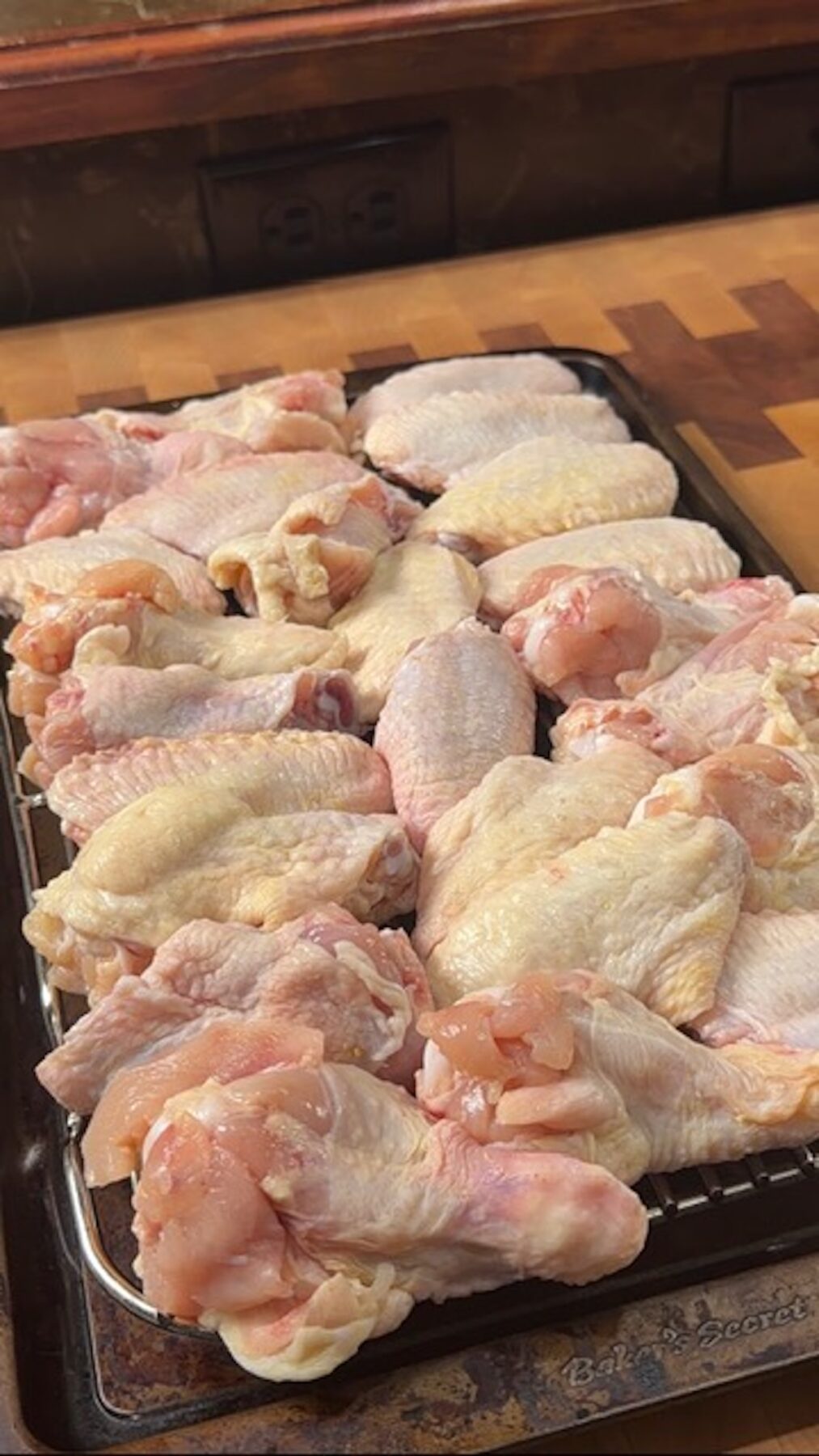 raw trash wings on rack