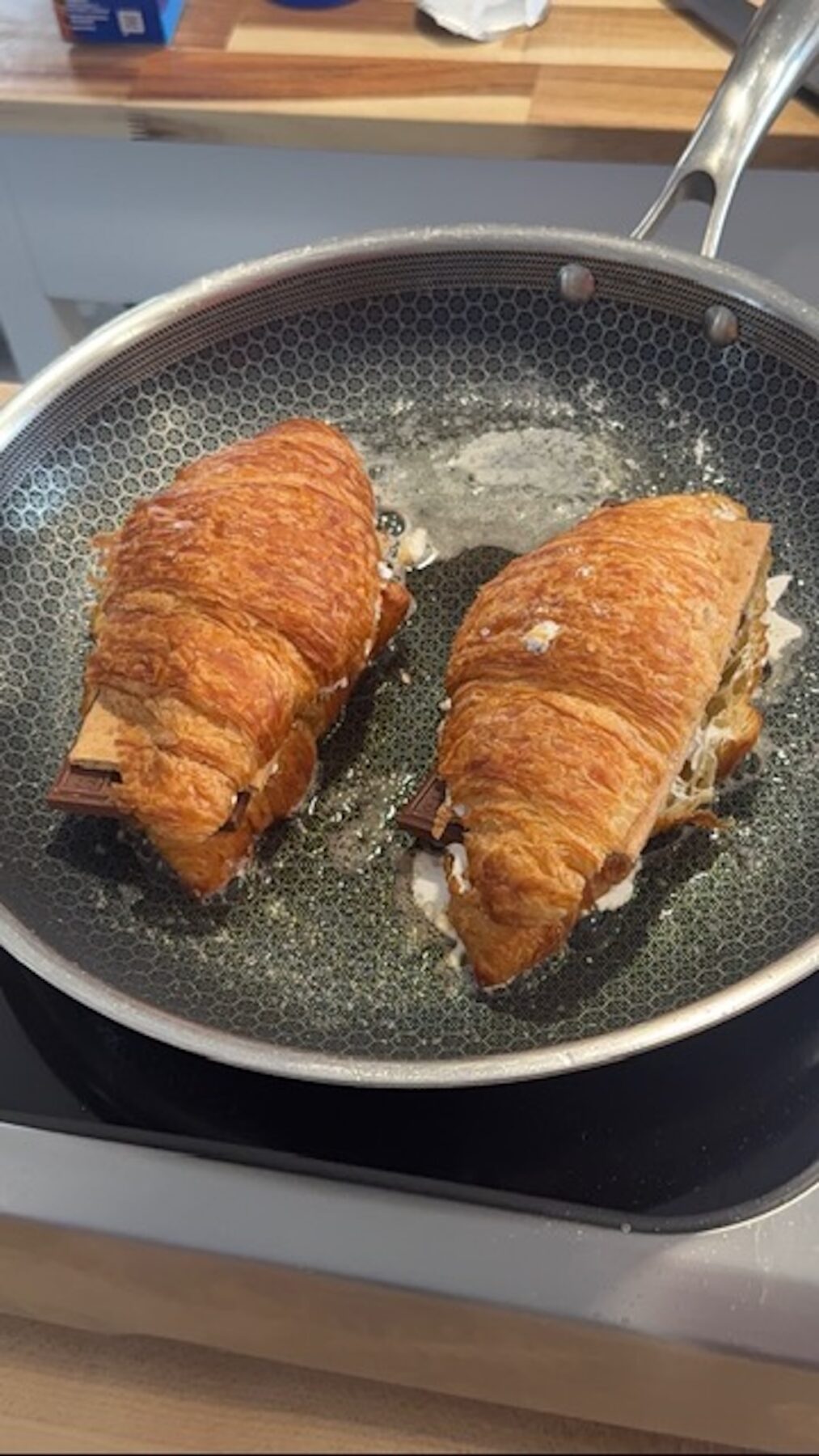2 smores churros croissant sandwiches in pan