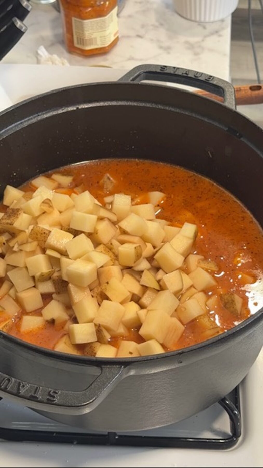 potatoes added to pot for marry me chicken potato soup
