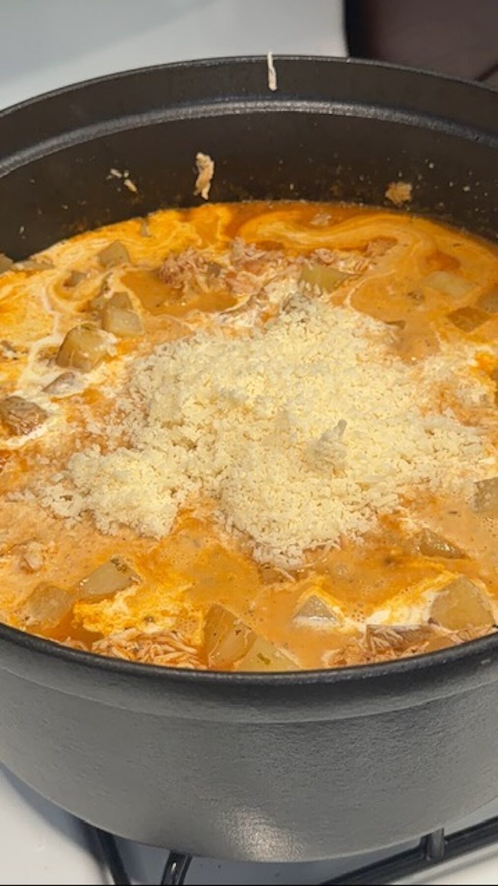 marry me chicken potato soup topped with grated cheese