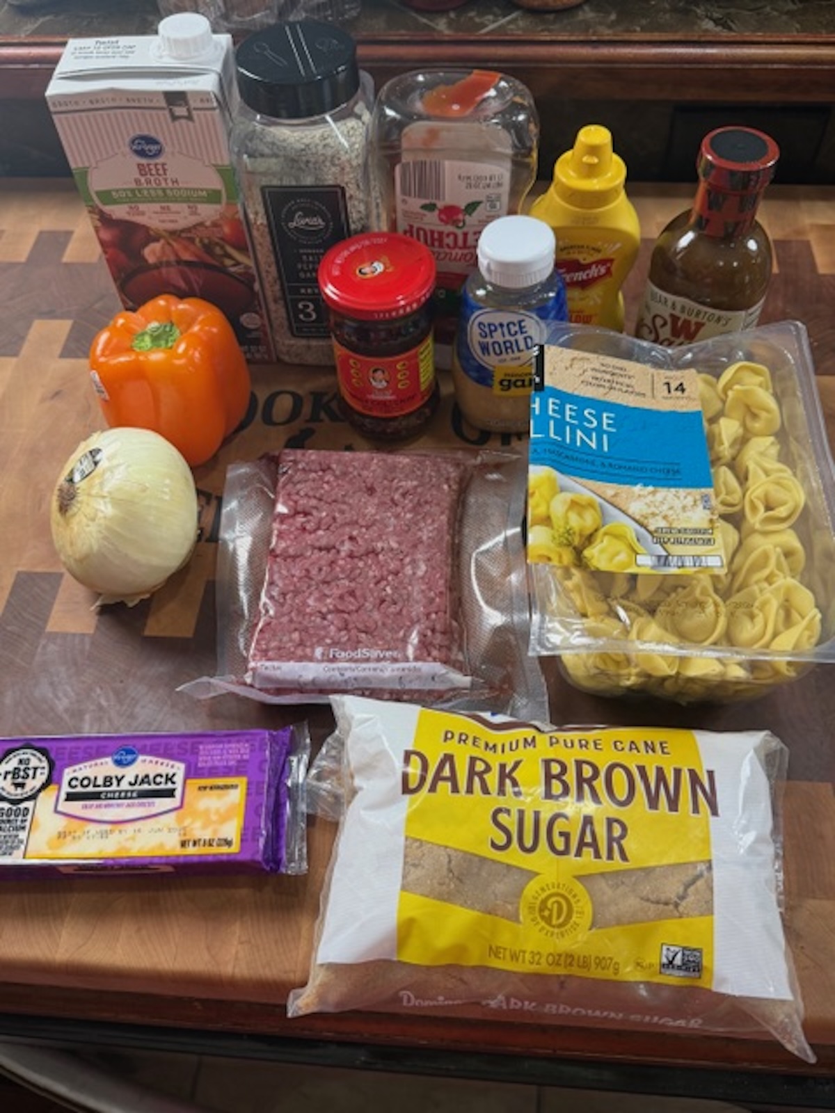 sloppy joe tortellini ingredients on cutting board